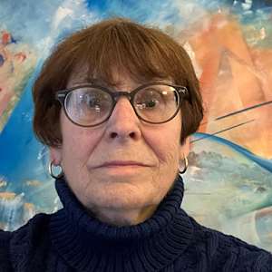 Photographs over the years by Amy Ione  Image: Amy Ione, 2024, in front of the painting South Africa.