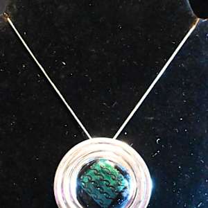 Fused  green dichroic glass with chain pattern sterling silver flat wave pendant by Susan Mason, Image 1.