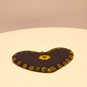 Fused Glass Heart-Shaped Sunflower Paperweight by Susan Mason, Image 1.
