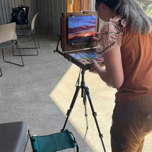 Twin Sisters in Evening Finery by Lindy Cook Severns  Image: Painting demo at the Museum of the Big Bend as part of the 37th annual Trappings of Texas opening events