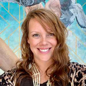 Kindness by Lindsey Veil  Image: Artist in front of the painting.