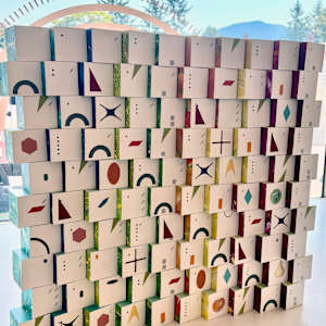 100-Block Prime Numbers Puzzle (10x10 grid - 2.5 inch cubes) by Juliet Fiss  Image: Installation - Side 1