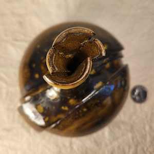Small Sliced Vase II by Tony Hyden  Image: small modernist ceramic sculpture of a traditional vase altered - top view