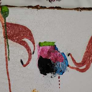 Juice Box by Lisa Petsu  Image: Detail center stuffed painting with recycled baby shower favors.