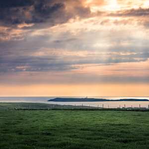 Malin Beg - Signal Tower and Lighthouse in Dappled Light by Juan Matorras