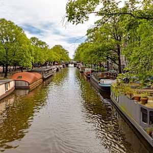 Historic canals in Amsterdam, Netherlands. by David Whited