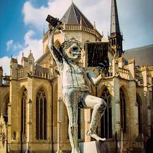 Fonske Statue in Leuven, Belgium: Symbol of Student Life and Wisdom by David Whited