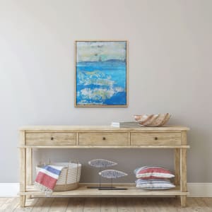 "MadIsland #4" by Steven McHugh  Image: Room setting, "MadIsland #4 is a captivating work of art that will add depth and character to any room. The combination of oil stick, oil, beach sand, and cold wax creates a one-of-a-kind texture that draws the eye. Measuring 19.5" x 15.5" and framed in a gallery floater frame, this piece is ready to be hung and admired. The varnished wood frame provides a sleek and modern look that will complement any decor. Own a piece of original abstract art that is sure to start conversations and inspire contemplation.