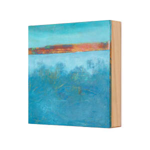 "Landscape #17" by Steven McHugh  Image: Side view of  "Landscape #17," a small abstract oil and cold wax painting on an 8" x 8" x 2.5" panel by Madeline Island artist Steve McHugh. This versatile work, thanks to its deep panel, can be elegantly hung or displayed on a shelf, seamlessly integrating into any space. A unique addition to your collection, this artwork brings a touch of Madeline Island's natural beauty and Steve's distinct non-representational style into your home. Enjoy the convenience of complimentary shipping within the U.S., included in the price, when you purchase this captivating piece from stevemchughart.com.

This abstract painting featuring a serene, predominantly blue color palette. The lower portion of the painting consists of rich, deep blues with a mix of green and yellow hues that blend together smoothly, suggesting the impression of water. There is an indistinct, misty quality to this section, with subtle textures and various shades adding depth.

Above the blue-toned section is a horizontal strip characterized by warm, earthy colors such as orange, red, and hints of green. This portion contrasts sharply with the cooler section below, possibly evoking a landscape or horizon line at sunset or sunrise. The warm band is textured and slightly irregular, imparting a sense of movement or distant terrain.

In the upper portion of the painting, a soft, light blue expanse creates the sky, blending seamlessly with the overall composition. The transition from the blue expanse of the sky to the warmer horizontal strip is smooth, maintaining a cohesive and tranquil visual experience.