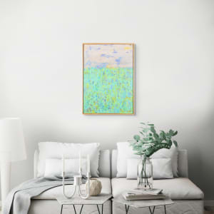 "Moments" by Steven McHugh  Image: Room view, "Moments" is a stunning original abstract landscape painting by Steve McHugh, created using a unique mixed media technique of oil and cold wax, and crayon on wood panel. This beautiful piece is  framed in a gallery floating frame, perfectly showcasing its dimensions of 29.75" x 21.75". "Moments" captures an impressionistic version of a field and sky, with vibrant shades of green dominating the lower two-thirds, while a strikingly dynamic sky takes center stage in the upper one-third. This masterpiece brings the beauty of nature to life with its bold colors and emotive brushstrokes, making it the perfect addition to any art lover's collection.

The artwork is a painting featuring an expansive field of textured, vertical brushstrokes in various shades of light green and blue, conveying the vitality of a lush meadow. Hints of yellow, red, and darker blues are interspersed throughout the field, suggesting the presence of wildflowers or variations in foliage. Above the field, the sky is rendered with horizontal strokes of pale blue, white, and a touch of yellow, reflecting the soft light of either dawn or dusk. The cumulative effect is one of a dreamy, impressionistic landscape that invites the viewer to experience the calm and beauty of a serene, natural setting. The painting is framed with a simple, unadorned frame that encloses the artwork.