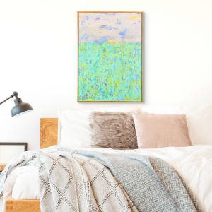 "Moments" by Steven McHugh  Image: Room view, "Moments" is a stunning original abstract landscape painting by Steve McHugh, created using a unique mixed media technique of oil and cold wax, and crayon on wood panel. This beautiful piece is  framed in a gallery floating frame, perfectly showcasing its dimensions of 29.75" x 21.75". "Moments" captures an impressionistic version of a field and sky, with vibrant shades of green dominating the lower two-thirds, while a strikingly dynamic sky takes center stage in the upper one-third. This masterpiece brings the beauty of nature to life with its bold colors and emotive brushstrokes, making it the perfect addition to any art lover's collection.

The artwork is a painting featuring an expansive field of textured, vertical brushstrokes in various shades of light green and blue, conveying the vitality of a lush meadow. Hints of yellow, red, and darker blues are interspersed throughout the field, suggesting the presence of wildflowers or variations in foliage. Above the field, the sky is rendered with horizontal strokes of pale blue, white, and a touch of yellow, reflecting the soft light of either dawn or dusk. The cumulative effect is one of a dreamy, impressionistic landscape that invites the viewer to experience the calm and beauty of a serene, natural setting. The painting is framed with a simple, unadorned frame that encloses the artwork.