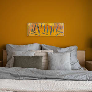 "For You" by Steven McHugh  Image: Room view of "For You," an original painting by the Madeline Island artist Steve McHugh. This abstract landscape masterpiece is created using oil and cold wax on a wood panel, and beautifully framed in a gallery floating frame. The warm orange and yellow background serves as a striking contrast to the vertical trees in blue textured hues. This stunning artwork is sure to captivate your attention and add a touch of elegance to any space. Whether you're an art enthusiast or simply looking for a unique piece to add to your collection, "For You" promises to be a remarkable addition to your home or office decor.

This artwork is a painting depicting an abstract forest scene. The background is a warm, glowing gradient of yellows and oranges, representing an illuminated or autumnal sky or atmosphere. The trees are rendered in bold, dark blue and black hues with angular, almost jagged shapes. The trees and their shadows create a sense of depth and movement, with diagonal lines cutting across the composition. The overall effect is both dynamic and serene, capturing the essence of nature through expressive color and form.

Painting is 10.75" x 30" and is ready to hang in your envirorment.  