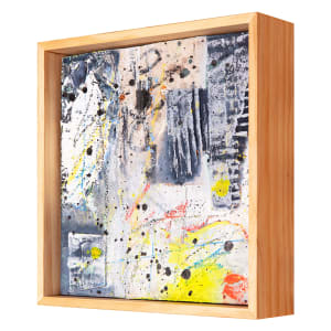 "Deconstruction #3" by Steven McHugh  Image: Side view of "Deconstructed #3," a one-of-a-kind collage painting by Madeline Island artist, Steve McHugh. This stunning piece features a surface created using a combination of paper, cardboard, and canvas on a wood 8" x 8" panel, and is painted with a mix of oil, cold wax, graphite, and crayon. McHugh's signature touch is evident in the unique way he signs the painting with a red thumbprint, adding an extra layer of intrigue to the piece. With thick paint, paint splatters, and bold mark-making, "Deconstructed #3" exudes a chaotic energy that demands exploration. This is an absolute must-have for any art collector looking to add a truly unique and captivating piece to their collection. Painting is framed in a natural wood gallery floating fame.

This artwork is an abstract painting filled with an array of colors and textures. The canvas displays a chaotic yet harmonious composition, featuring splashes and splatters of black, yellow, red, and blue paint. Steve has employed various techniques to create depth and visual interest, including thick applications of paint and textured surfaces. Some areas are lighter and more delicate, while others are dense with dark, heavy strokes. The piece is framed in a simple wooden frame, which contrasts with the vivid and dynamic nature of the painting.

Shipping costs and sales tax will be added after destination is determined.