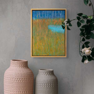 "Let's Go Frogging" by Steven McHugh  Image: Room  view of "Let's Go Frogging," by Madeline Island painter, Steve McHugh. This charming 14.5" x 10.5" oil and cold wax painting captures the whimsy and nostalgia of days spent pond-side, searching for frogs. The natural wood finished gallery floating frame adds a touch of modern elegance to the piece, making it a perfect addition to any art collection. With its depiction of tall summer grasses and a hidden pond nestled just in front of a line of trees, "Let's Go Frogging" will bring a sense of tranquility and warmth to any space. Add a touch of nostalgia and whimsy to your home or office with this stunning piece by Steve McHugh.

This painting features a serene natural landscape. It prominently displays tall grasses with hues of green, yellow, and orange in the foreground, suggesting vegetation in the midst of a field or meadow. Towards the middle right of the composition, there is a small pond or water feature painted in shades of blue and turquoise. The background showcases a line of trees rendered in cooler tones of blues and purples, providing a peaceful and tranquil backdrop to the scene. The painting uses a mix of vivid and muted colors to create a harmonious blend, evoking a sense of calm and natural beauty.

Sales tax and shipping will be added after location is determined