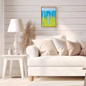 "Dreamscape" by Steven McHugh  Image: Room view of  "Dreamscape," a dreamy abstract landscape painting by Madeline artist Steve McHugh. This exquisite piece, crafted with oil and cold wax on a wood panel of 14.25" x 10.5" x 2.5", showcases vertical old trees against a serene blue horizon and bold yellow near foliage. Framed in a sophisticated wood-finished gallery floating frame, it is a refined addition to any art collection. Each piece is personally signed by Steve McHugh on both the front and back, ensuring authenticity and a personal touch. 

This abstract landscape  is a vibrant painting featuring a composition of tall, vertical  tree trunks. The background transitions from a soft, muted purple at the top to a gradient blue and cyan, giving a sense of depth and atmosphere. The middle section is predominantly blue with vertical streaks, while the bottom third of the painting is filled with dynamic and textured yellow patches, suggesting a  forest floor. The interplay of cool blue tones with the bright yellow creates a striking visual contrast, evoking a vivid and energetic landscape. The brushstrokes are expressive and contribute to the overall impressionistic feel of the piece.