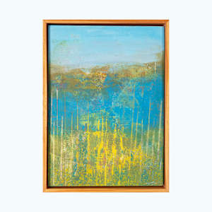 "My Escape" by Steven McHugh  Image: "My Escape"  is an abstract landscape painting, oil and cold wax on wood panel,  that uses a palette of blues, yellows, and earth tones. The lower portion is dominated by textured and layered yellow and green hues that suggest a dense, vibrant field or forest, a magical view of Town Parks lagoon from above. Vertical streaks of yellow and light tones rise upward through the center, imitating tall grass or slender tree trunks. The midsection transitions into deeper blue colors that evoke a watery or ethereal atmosphere, blending seamlessly into a hazy, muted background of soft browns and ochres. The top of the painting is a calm, clear sky depicted in light blue. The composition is balanced with a mix of organic forms and linear elements, creating a serene yet dynamic natural scene. The painting is framed with a simple wooden frame that complements the earthy tones and measures 14.3" x 10.5" x 2.5".

"My Escape" is an abstract landscape painting, oil and cold wax on wood panel, that uses a palette of blues, yellows, and earth tones. The lower portion is dominated by textured and layered yellow and green hues that suggest a dense, vibrant field or forest, a magical view of Town Parks lagoon from above. Vertical streaks of yellow and light tones add an ethereal dimension, embodying the serene beauty of Madeline Island. This piece invites viewers to lose themselves in its rich layers and vibrant colors, offering an evocative visual journey. Discover the heart of the Apostle Islands through this captivating creation, perfect for those who appreciate the harmonious blend of nature and abstract art.