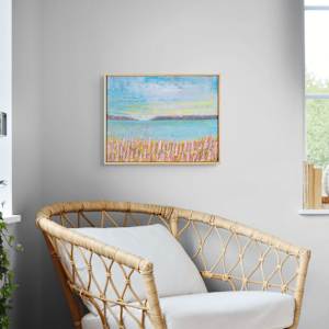"Lupines #2" by Steven McHugh  Image: Interior view of "Lupines #2", a captivating mixed-media artwork inspired by the stunning landscapes of Madeline Island, part of the Apostle Islands in Lake Superior, WI. This non-representational abstract piece artistically captures the serene essence and vibrant hues unique to the region. As an artist dedicated to exploring nature's profound impact through innovative techniques, I create works that transcend the ordinary, offering a glimpse into the harmonious balance of form and color. Experience the timeless allure of "Lupines #2" and elevate your space with a touch of Madeline Island's natural splendor. 

This  serene abstract landscape painting features a field of tall, pink and violet Lupine flowers in the foreground. The flowers are dense and cover the bottom section of the canvas, providing a vibrant contrast to the calm waters of a sea, Lake Superior,  that extends horizontally across the middle of the artwork. In the distance, there are two dark, softly blended island landmasses on the horizon line. The sky occupies the upper half of the painting, rendered in soft hues of blue with light touches of yellow and orange near the horizon, suggesting a sunrise or sunset. The overall texture of the painting is slightly rough with visible brushstrokes, adding depth and a gentle impressionistic feel to the scene. The artwork is framed in a simple, light wood frame.

Cold wax and oil paint on wood panel, measures 15" x 19.5" x 1.5", natural wood finished gallery floating frame measures 15/75" x 20.25" x 2.5".
