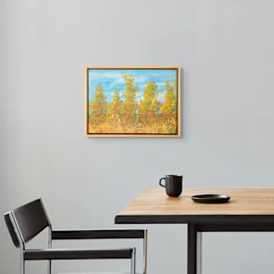 "Spring Walk" by Steven McHugh  Image: Interior view of "Spring Walk", this mixed-media piece captures the essence of nature's awakening, reflecting the dynamic interplay of colors and textures that define the Apostle Islands in Lake Superior, WI. This creation exemplifies my commitment to offering unique, non-representational artworks that evoke emotion and spark imagination. Experience the transformative power of color and form with "Spring Walk," and bring a piece of nature's rebirth into your space.

"Spring Walk"  is a vibrant abstract landscape painting showcasing tall, slender trees with foliage in warm spring colors such as yellow, orange, and hints of red. The trees stand against a bright blue sky with some white clouds, creating a contrast between the cool background and the warm tones of the leaves. The brushstrokes are textured and expressive, imparting a sense of movement and natural liveliness. The foreground is filled with dense, colorful shrubbery, blending harmoniously with the trees to form a richly detailed and lively spring scene. The painting is framed in a simple wooden frame that complements the earthy tones of the artwork.

Painting is oil and cold wax, mixed media painting on wood panel measuring  9.75" x 13.5" x 1.5", framed in gallery floating frame measures 10.6" x 14.3" X 2.5". 