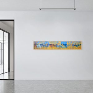 "Big Bay Road" by Steven McHugh  Image: Interior installation view of "Big Bay Road,"  a panoramic landscape painting featuring a dense forest composed of tall, slender trees with white trunks and autumnal foliage in vibrant shades of gold, orange, and yellow. The trees create vertical lines that contrast against a deep blue background suggesting a clear sky and distant water. The composition balances the bright, warm colors of the leaves with the cool blue tones, creating a striking visual effect. The scene conveys a serene atmosphere with an abstract, almost impressionistic style, emphasizing color and form over detailed realism.

Immerse yourself in the essence of Madeline Island with "Big Bay Road," a mixed-media abstract piece crafted by Madeline Island's resident abstract painter, Steve McHugh. This evocative artwork captures the untamed spirit of the Apostle Islands, bringing the ethereal beauty of Lake Superior to your space. Each brushstroke and texture uniquely conveys a non-representational journey through the island's rugged landscapes. Perfect for art enthusiasts seeking a vibrant, dynamic accent for their home or office, "Big Bay Road" embodies the rich, scenic splendor of Wisconsin's northern wilderness. Transform your interior with this compelling piece that resonates deeply with the natural world.

This oil and cold-wax painting is on a wood panel and measures 12 x 72" x 1.5", framed in a gallery floating frame measures 13" x 73" x 2.5". Shipping is included in the lower 48 U.S. states.