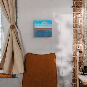 "Over There" by Steven McHugh  Image: Interior installation view of "Over There,"  a abstract landscape painting capturing a vibrant sky and body of water. The upper portion features a bright blue sky with textured clouds in soft peach and coral hues. Below the horizon, a bold reddish-orange strip separates the sky from the water. The lower half depicts deep blue water with darker patches and subtle white reflections, rendered with rough, expressive brushstrokes, creating a sense of movement and depth. The overall color palette conveys a dramatic and dynamic natural scene.

"Over There" represents the view of any Islander, you're constantly looking to the horizon to see what's coming, weather or ferry.  This oil and cold-wax painting on wood panel measures 9.75" X 9.75" X 1.5" and is in a gallery floating frame measuring 10.5" x 10.5" x 2.5".  Shipping is included in the U.S.

Discover the captivating world of abstract art with our mixed-media creations from Steve McHugh. Nestled on the picturesque Madeline Island in the Apostle Islands of Lake Superior, WI, each piece is a unique blend of texture, color, and emotion, offering a transformative visual experience. My commitment to artistic excellence and innovative techniques ensures that every artwork adds a distinctive touch to your space. Find the perfect piece to enrich your environment with the rich, layered beauty of abstract expression. Dive into the elegance and sophistication that only original mixed-media art can provide.