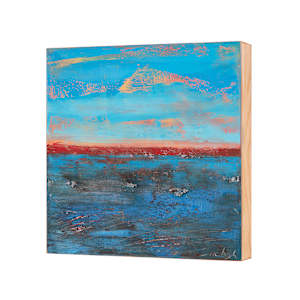 "Over There" by Steven McHugh  Image: Side view of "Over There,"  a abstract landscape painting capturing a vibrant sky and body of water. The upper portion features a bright blue sky with textured clouds in soft peach and coral hues. Below the horizon, a bold reddish-orange strip separates the sky from the water. The lower half depicts deep blue water with darker patches and subtle white reflections, rendered with rough, expressive brushstrokes, creating a sense of movement and depth. The overall color palette conveys a dramatic and dynamic natural scene.

"Over There" represents the view of any Islander, you're constantly looking to the horizon to see what's coming, weather or ferry.  This oil and cold-wax painting on wood panel measures 9.75" X 9.75" X 1.5" and is in a gallery floating frame measuring 10.5" x 10.5" x 2.5".  Shipping is included in the U.S.

Discover the captivating world of abstract art with our mixed-media creations from Steve McHugh. Nestled on the picturesque Madeline Island in the Apostle Islands of Lake Superior, WI, each piece is a unique blend of texture, color, and emotion, offering a transformative visual experience. My commitment to artistic excellence and innovative techniques ensures that every artwork adds a distinctive touch to your space. Find the perfect piece to enrich your environment with the rich, layered beauty of abstract expression. Dive into the elegance and sophistication that only original mixed-media art can provide.