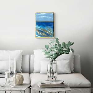 "Where The Sky Meets The Sea" by Steven McHugh  Image: Interior view of "Where The Sky Meets The Sea," an abstract seascape dominated by various shades of blue, creating a dynamic and flowing composition and rocky shoreline. The lower portion features energetic, sweeping brushstrokes in deep blue, turquoise, white, and hints of gold, suggesting movement in water or waves. A horizontal band of darker blue represents the horizon line, dividing the sea from the sky. Above the horizon, the sky is portrayed in softer, lighter blues with subtle white cloud-like streaks, adding depth and contrast to the scene. The piece evokes a sense of fluidity and natural rhythm through its use of color and texture.

This oil and cold-wax painting on wood panel measures 16.25"x12.25" x 2.5" in a gallery floating frame.

Discover the ethereal beauty of "Where The Sky Meets The Sea," an enchanting piece by representational abstract artist Steve McHugh. Created on the serene and inspiring Madeline Island, part of the Apostle Islands in Lake Superior, WI, this artwork captures the dynamic interplay of colors and textures where horizons blend into dreams. Immerse yourself in the vivid hues and intricate layers that invoke the seamless connection between the sky and sea, resonating McHugh's passion for his unique craft. Elevate your space with a piece that embodies the tranquility and boundless wonder of nature's majesty as envisioned by an island artist. Visit stevemchugh.art to bring home this masterpiece that sparks both contemplation and joy.