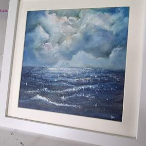 Stormy sky & sunlit water by Debi Garrett, Image 1.