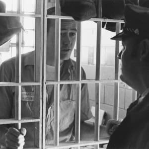 Inmate and Guard, Death Row, Cell House #3 Cañon City by Charles McNamara