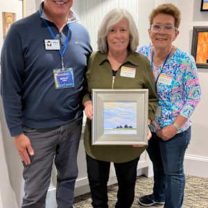 Back Bay Early Sunset by Lorraine  Dey  Image: Wesley, (L) purchased this painting at ArtFest Reception April 2023.