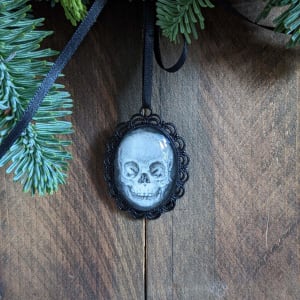 Human Child Skull - Black Metal & Glass Original Art Ornament by Layil Umbralux 
