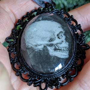 Human Skull Profile - Black Metal & Glass Original Art Ornament by Layil Umbralux 