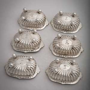 Untitled (6 Heavy English Sterling Silver Salt Cellars) by Artist Unknown 
