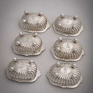 Untitled (6 Heavy English Sterling Silver Salt Cellars) by Artist Unknown 
