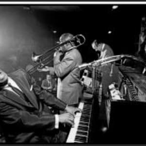 Earl Hines on Piano; Jimmy Archey on Trombone; Francis Joseph 'Muggsy' Spanier on Cornet; and Earl Watkins on Drums. San Francisco, California, USA, 1958 by Dennis Stock