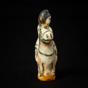 Untitled (Chinese Porcelain Figurine of a Horse and Rider) by Artist Unknown 