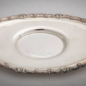 Untitled (Antique English Silver sauce Boat w/a Matching Tray) by Artist Unknown 