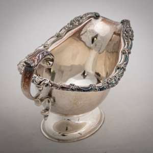 Untitled (Antique English Silver sauce Boat w/a Matching Tray) by Artist Unknown 