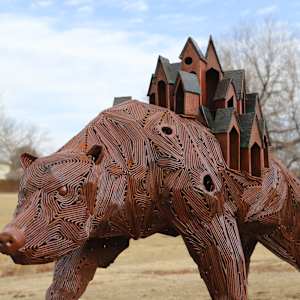 Endure by J. Aaron Alderman  Image: "Endure" showing small houses emerging from the bear's back.