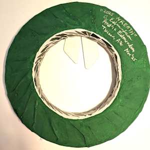 Wreath 2025 by Andrea L Edmundson  Image: Wreath 2025-back signed