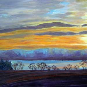 Sunset, Redcastle Estate Fields by Jan Clizer  Image: Looking across Beauly Firth towards Inverness on a cold winter afternoon from Fettes Farm.  Is it the Black Isle’s mystical history colouring my view, perhaps, or the moist air rising from the ever-changing Beauly Firth…or a bit of both?  This was a lovely rural winter scene I just HAD to attempt to capture!  Sketches were done outdoors in the invigorating cold air, but the actual painting was done in the comfort of my Idaho studio!