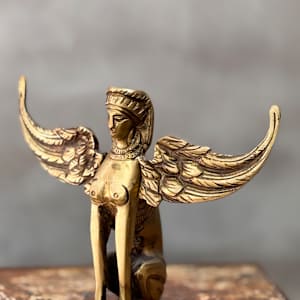 Winged Pair by Rigsby Frederick 