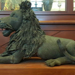 Two bronze lions by Cameroon