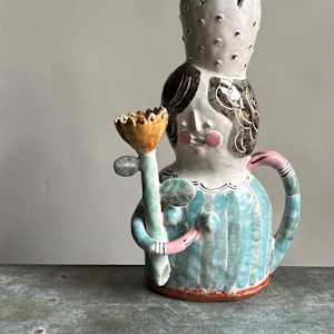woman holding flower vase no.1 by Alyssa Martz