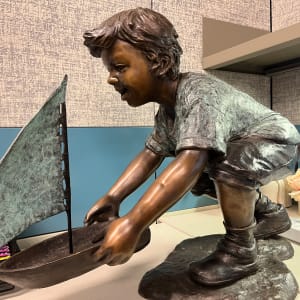 Boy and Sail Boat Sculpture 