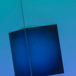 Green/Blue cube leaning by Aaron Farley 