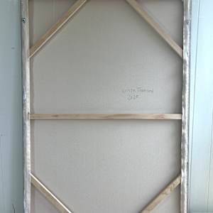 Body Memory by Krista Townsend  Image: The back of the painting showing a horizontal crossbar and corner braces. 