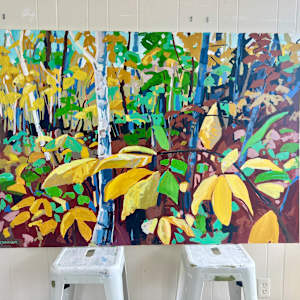 Early Fall by Krista Townsend  Image: The painting on two stools leaning against the studio wall.