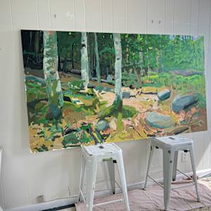 In Conversation With Trees by Krista Townsend  Image: The painting on two stools leaning on the studio wall.