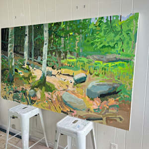 In Conversation With Trees by Krista Townsend  Image: The painting on two stools leaning on the studio wall.