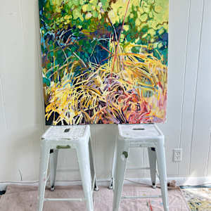 Microcosm by Krista Townsend  Image: The painting on two stools leaning against the studio wall.